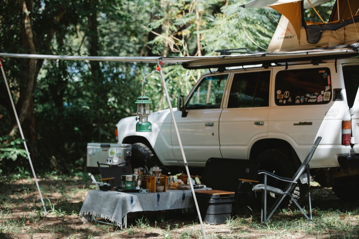 Minimal camping setup in a forest
