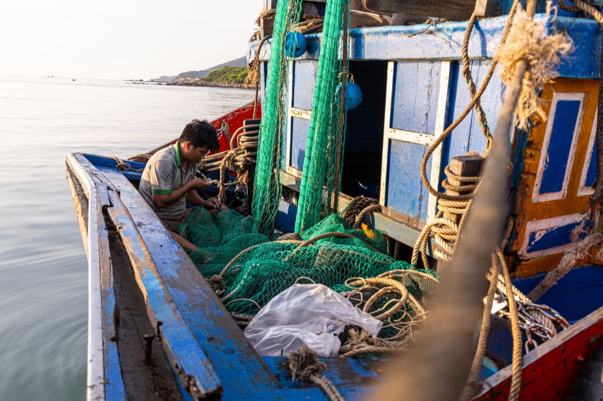fishing boat with gear and tackle box